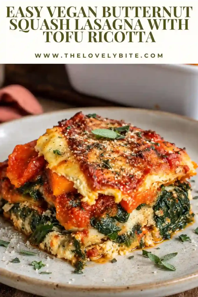 Freshly baked Vegan Butternut Squash Lasagna in a baking dish with roasted squash, spinach, mushrooms, and creamy tofu ricotta. The golden layered casserole makes a comforting gluten-free vegan dinner.