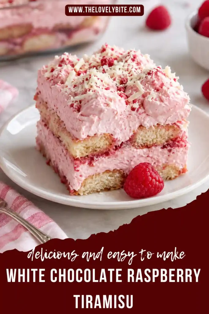 White Chocolate Raspberry Tiramisu served as neat dessert squares with visible layers of raspberry ladyfingers and mascarpone cream. The no-bake tiramisu is finished with finely grated white chocolate.