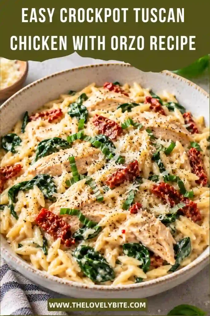 Bowl of Crockpot Tuscan Chicken With Orzo featuring juicy chicken pieces and tender pasta in a creamy Parmesan sauce. Spinach and sun-dried tomatoes add color and Tuscan-inspired flavor.