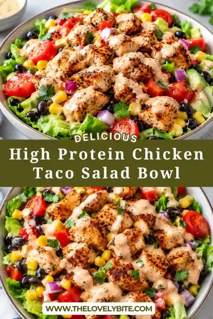 High Protein Chicken Taco Salad Bowl topped with seasoned sliced chicken, black beans, corn, cherry tomatoes, red pepper, and cheese. Creamy Greek yogurt taco dressing adds a fresh, tangy finish.