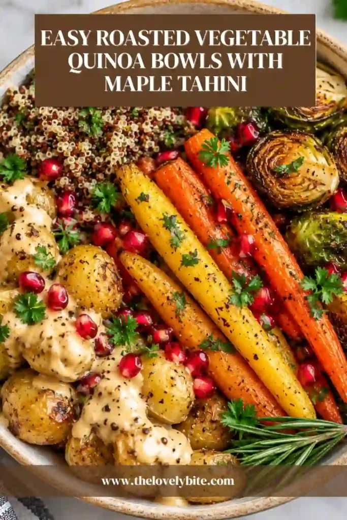 Autumn harvest bowl featuring fluffy quinoa and maple-roasted seasonal vegetables topped with fresh herbs and ruby-red pomegranate arils. A creamy tahini dressing is drizzled over the vegetables.